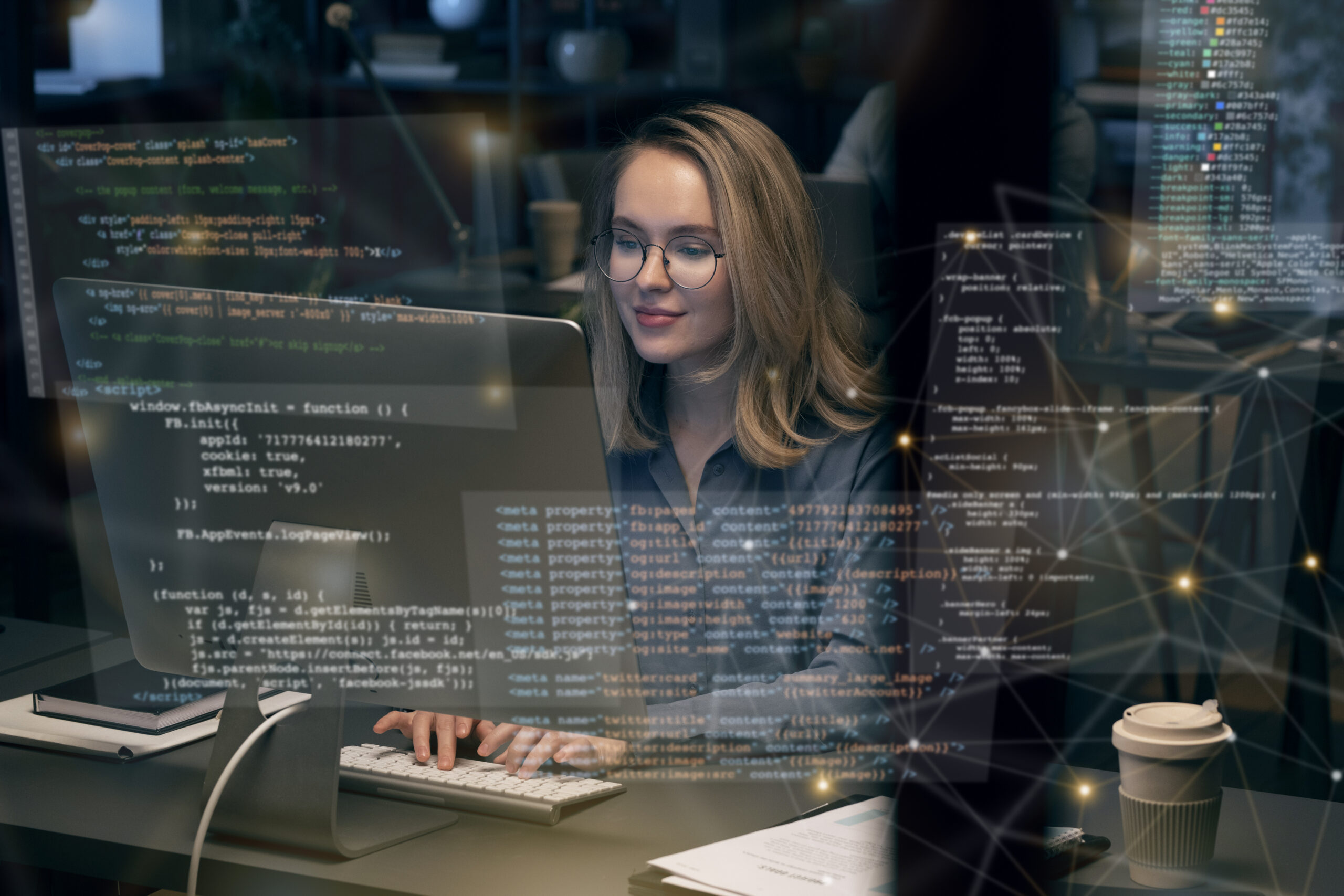 Java developer writing code on a computer.